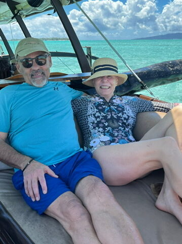 Estela and husband on a boat