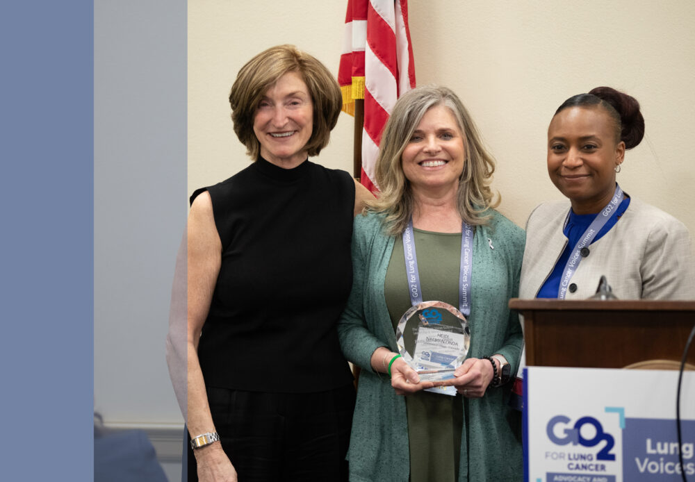 Heidi receiving an award at the Voices Summit