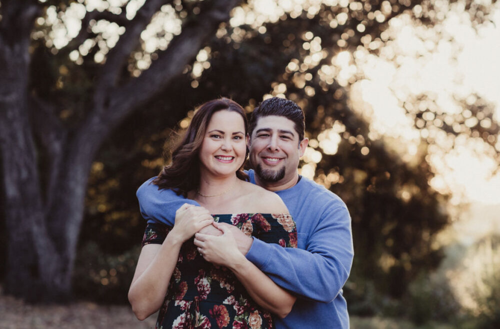Alisa and her husband outside