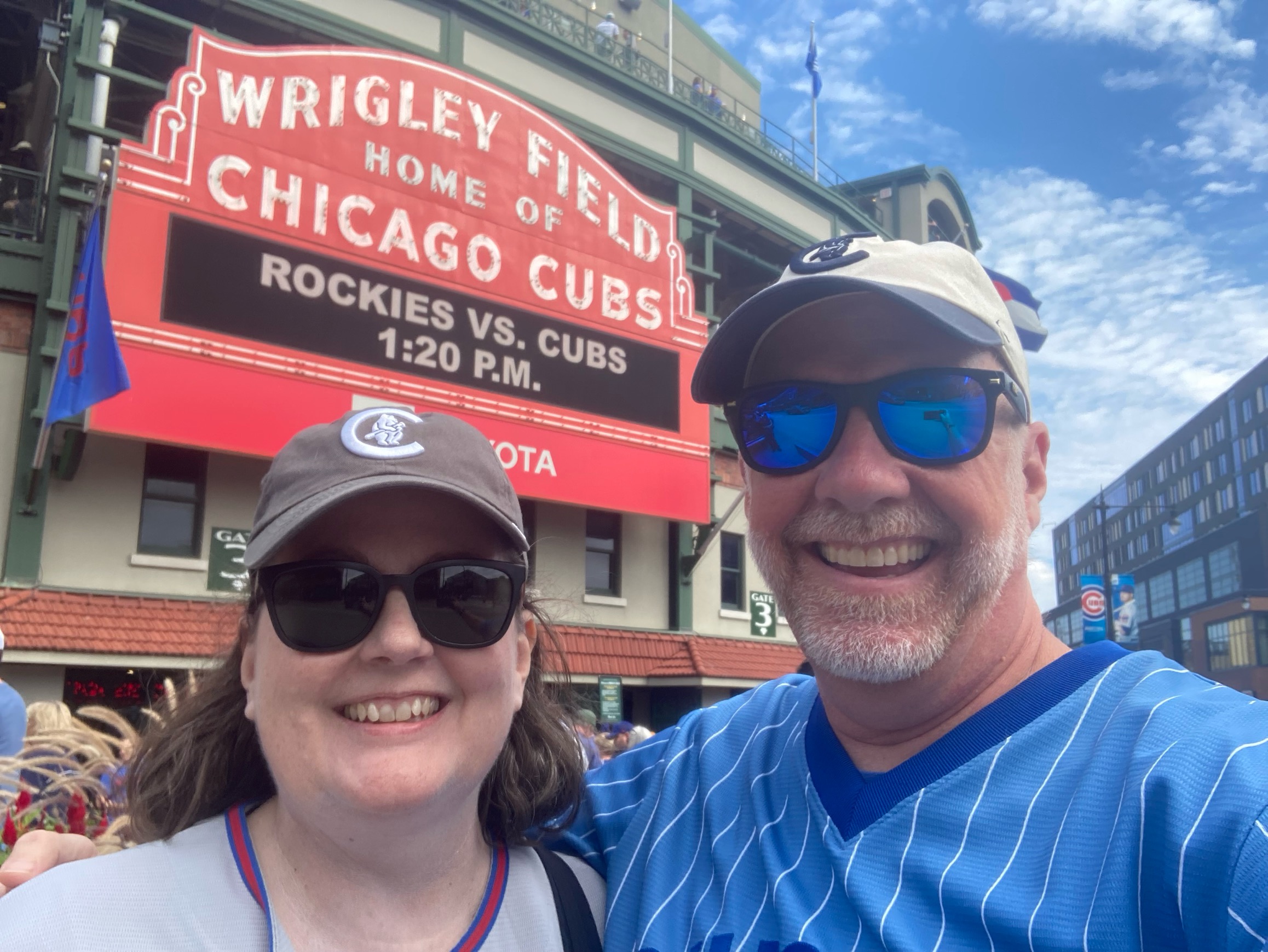 Jill and her husband at Wrigley Field Chicago