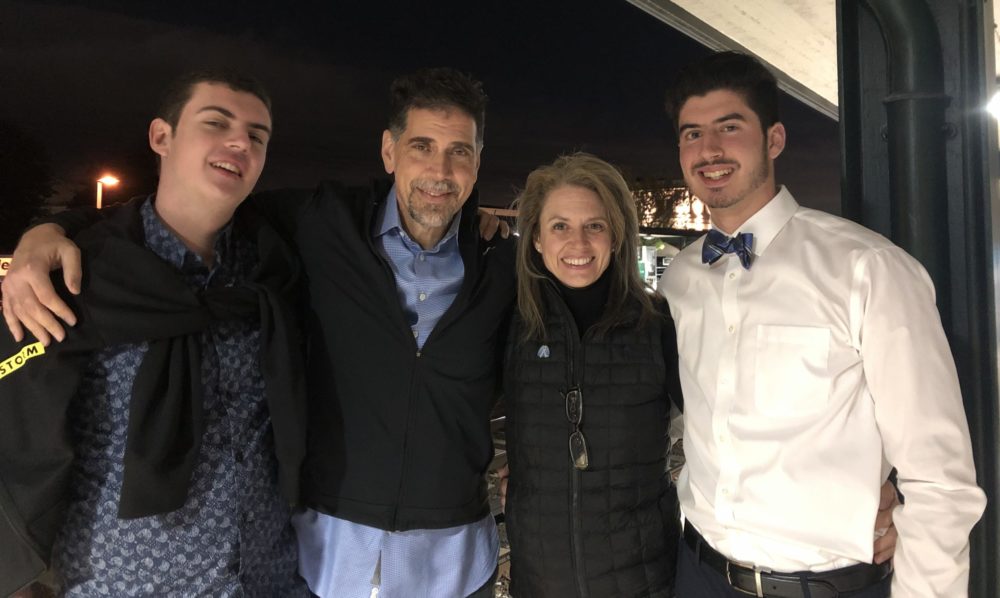Joelle Fathi with her husband and two sons