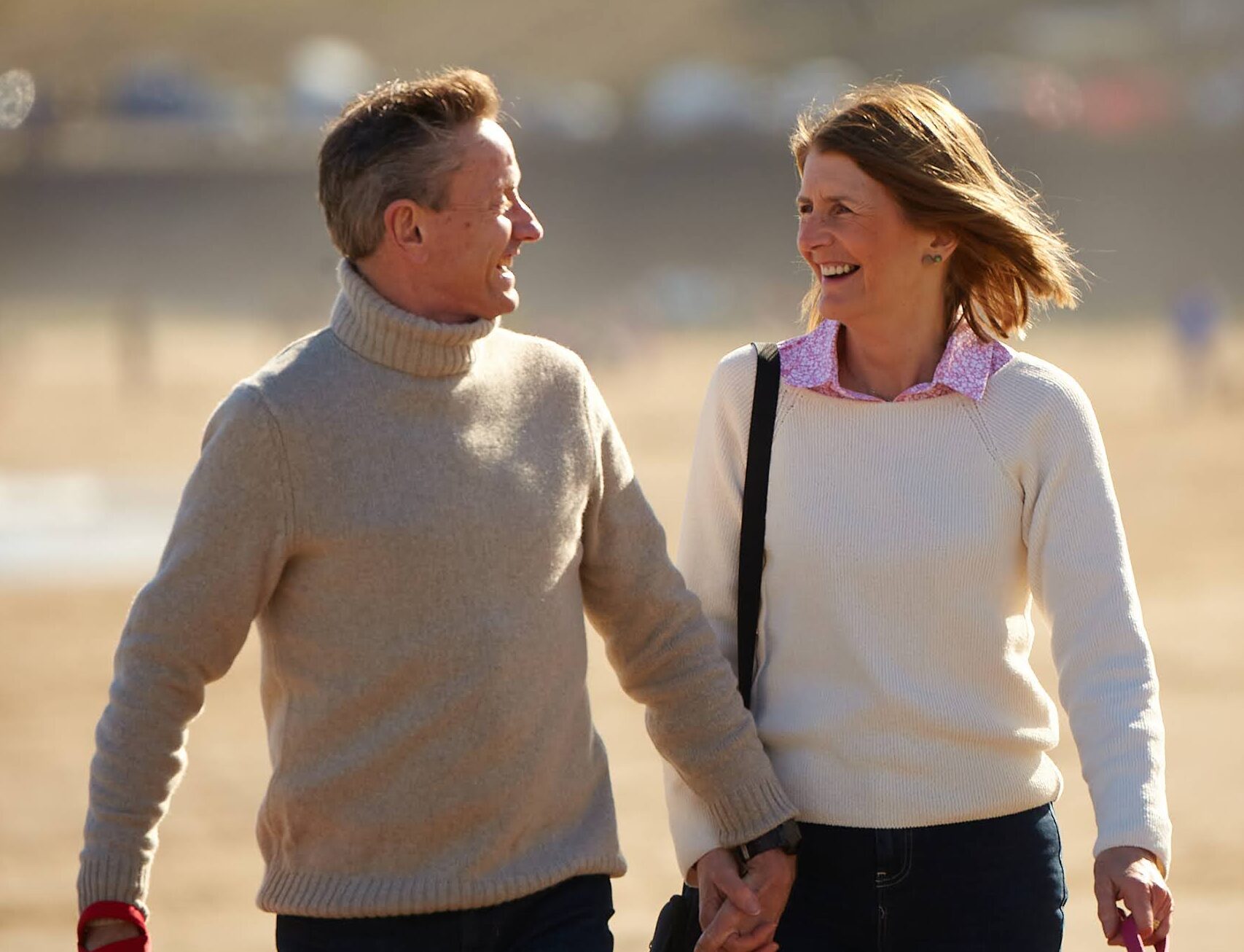Sean with his wife on a beach