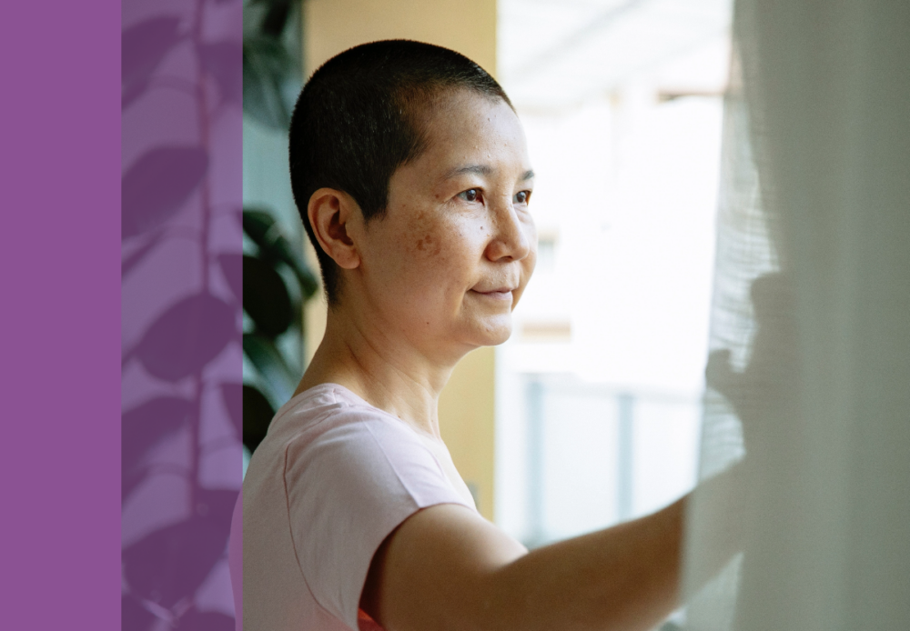 Woman looking out of a a window with purple overlay