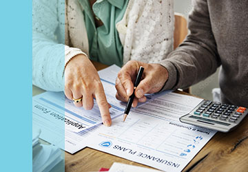 person looking at insurance plans